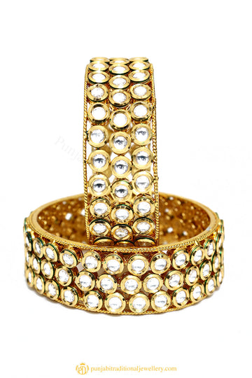 Gold Finished Bangles by PTJ